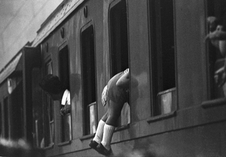 Treno del Sud, 005-068-03
Ferragosto. Assalto al treno per Reggio Calabria. Stazione Centrale, 1963
Milano (Italia)