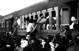 Treno del Sud, 005-068-11
Ferragosto. Assalto al treno per Reggio Calabria. Stazione Centrale, 1963
Milano (Italia)