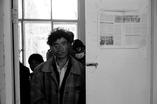 Tibet, 102-016-26
Uomo con malformazioni in volto in un ospedale, 2004
Shigatse (Tibet)